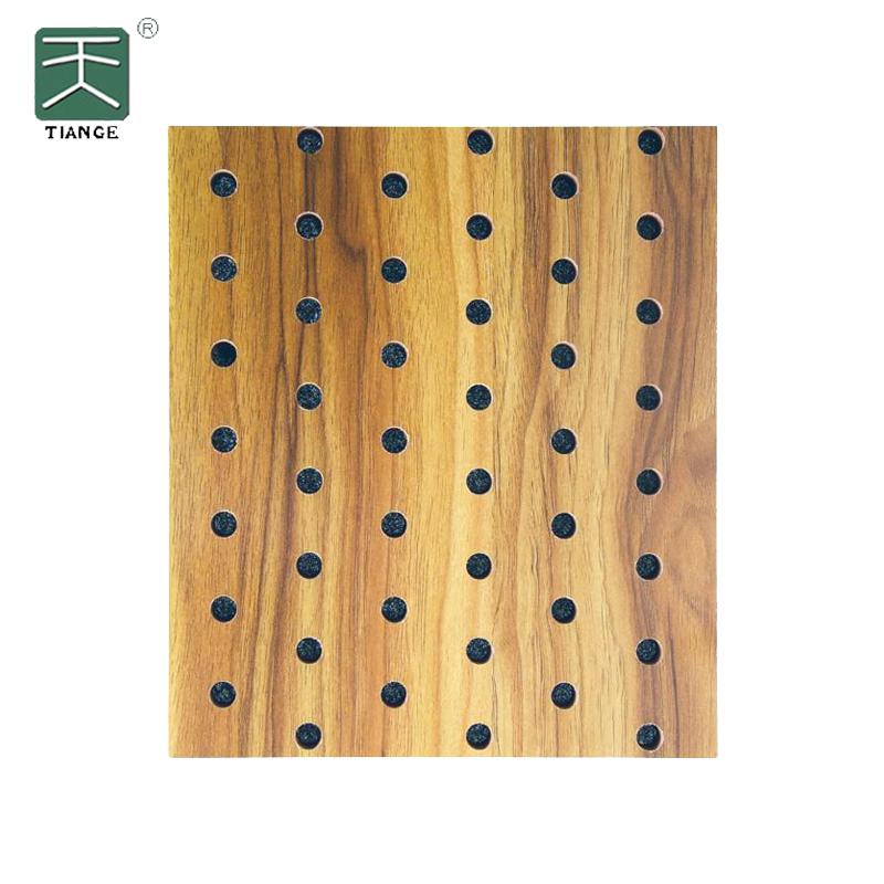 Wood Panel With Holes Elevates Hall Decor